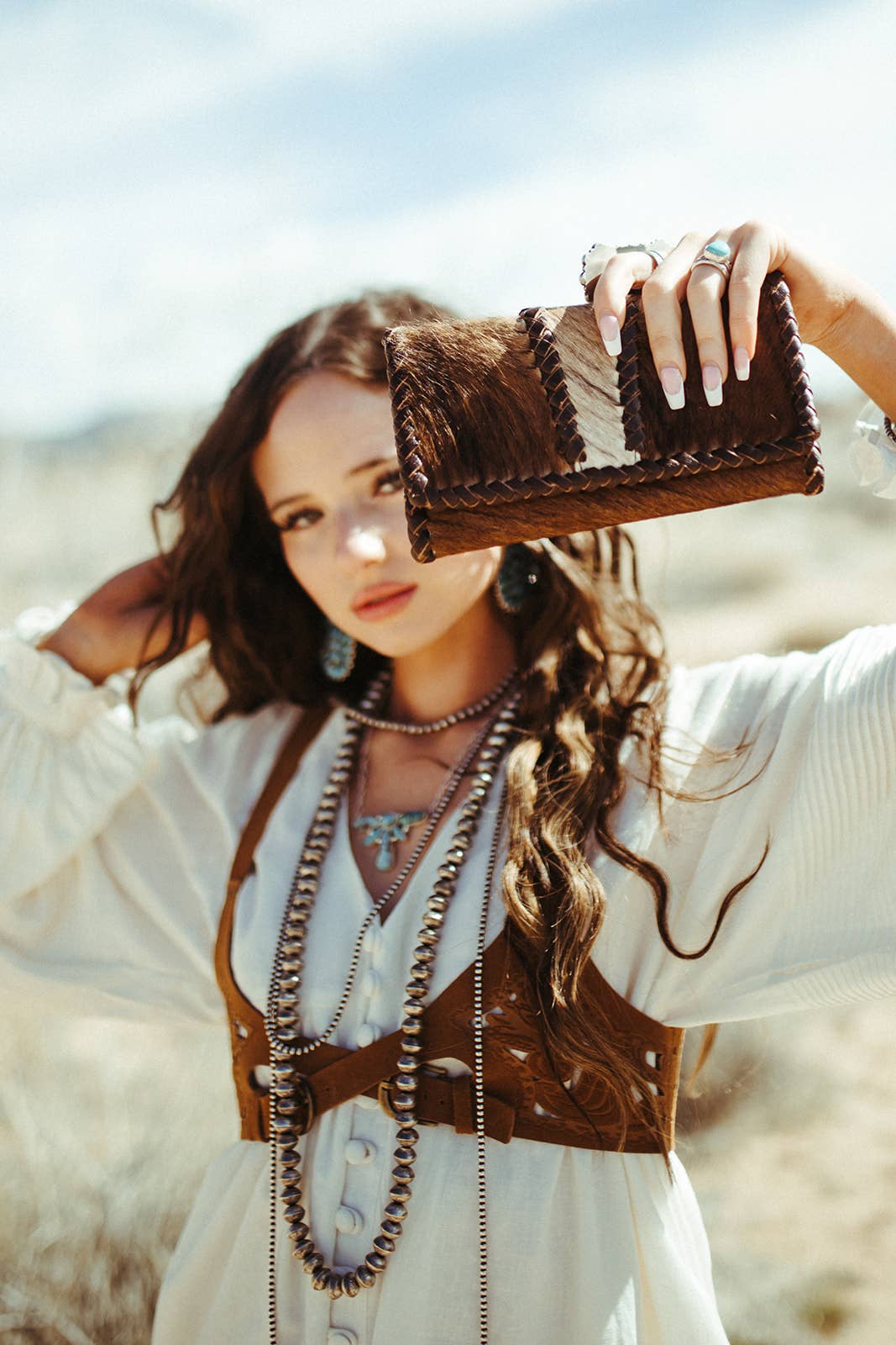The Louvelle Cowhide Purse a Haute Southern Hyde
